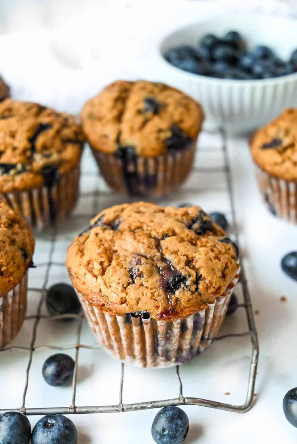 protein blueberry muffins on a cooling rack